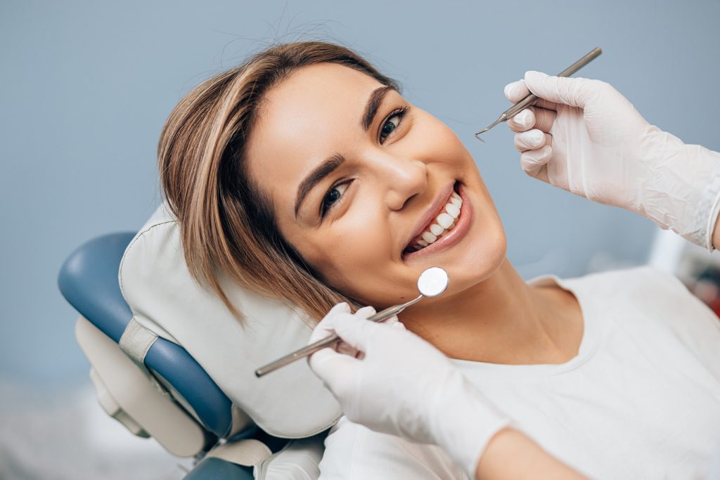 Portrait,Of,Young,Caucasian,Woman,With,Perfect,Smile,In,Dental