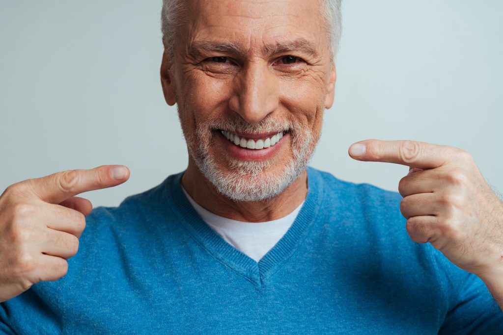 Handsome,Senior,Isolated,On,Grey,Background.,Concept,About,The,Third