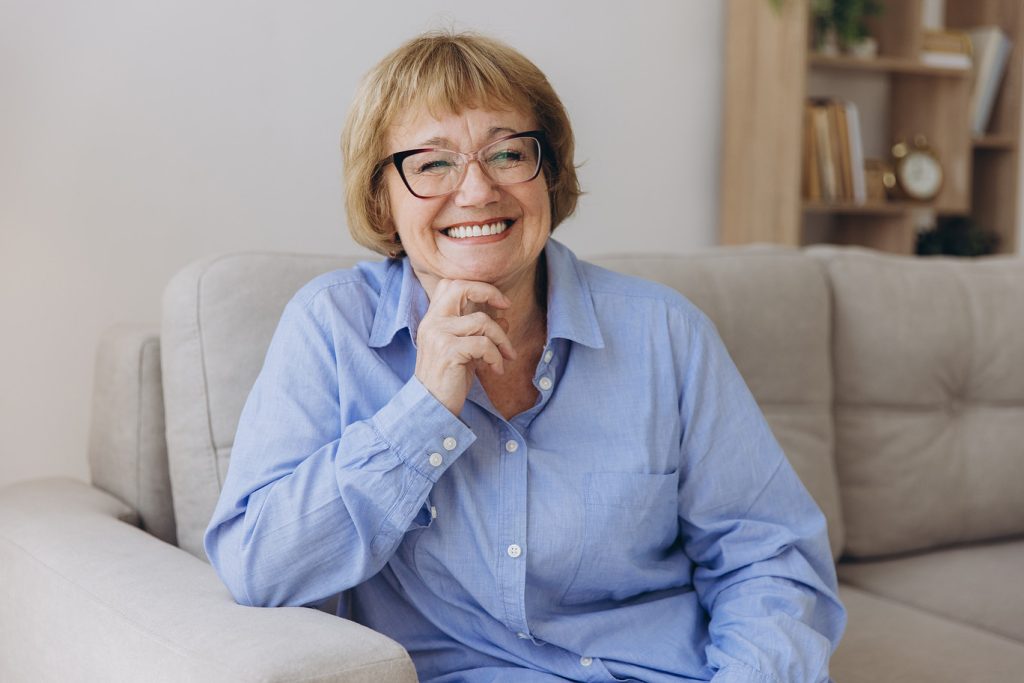 Smiling,Senior,Blonde,Haired,Woman,Looking,At,Camera,,Happy,Old