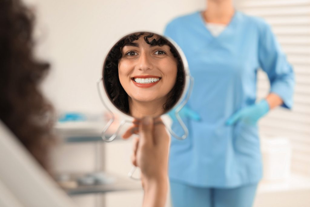 Patient,Looking,In,Mirror,And,Doctor,In,Clinic,,Selective,Focus.